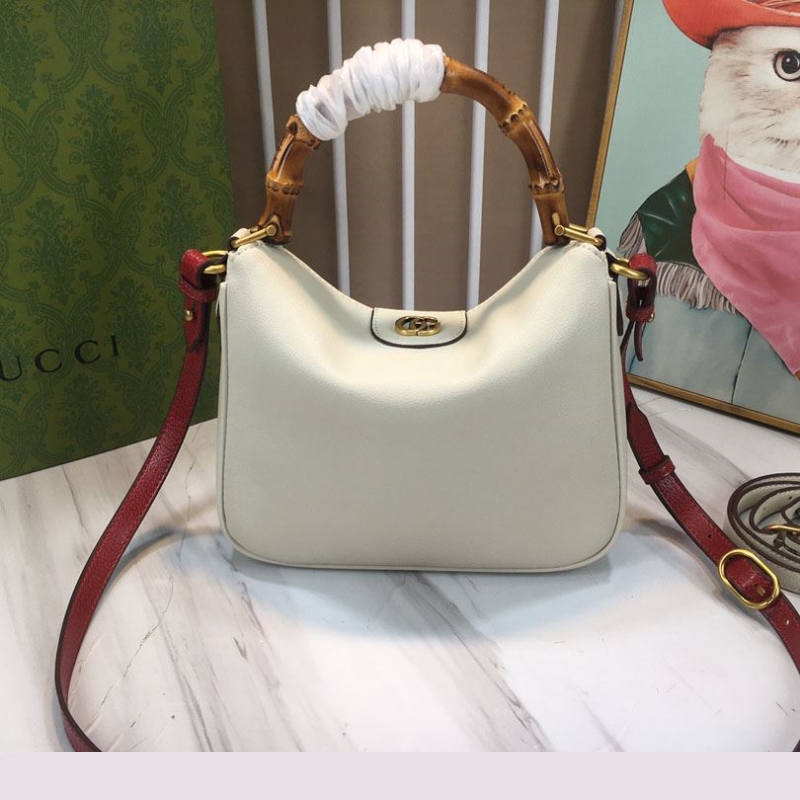 G*u*i top handle bags
